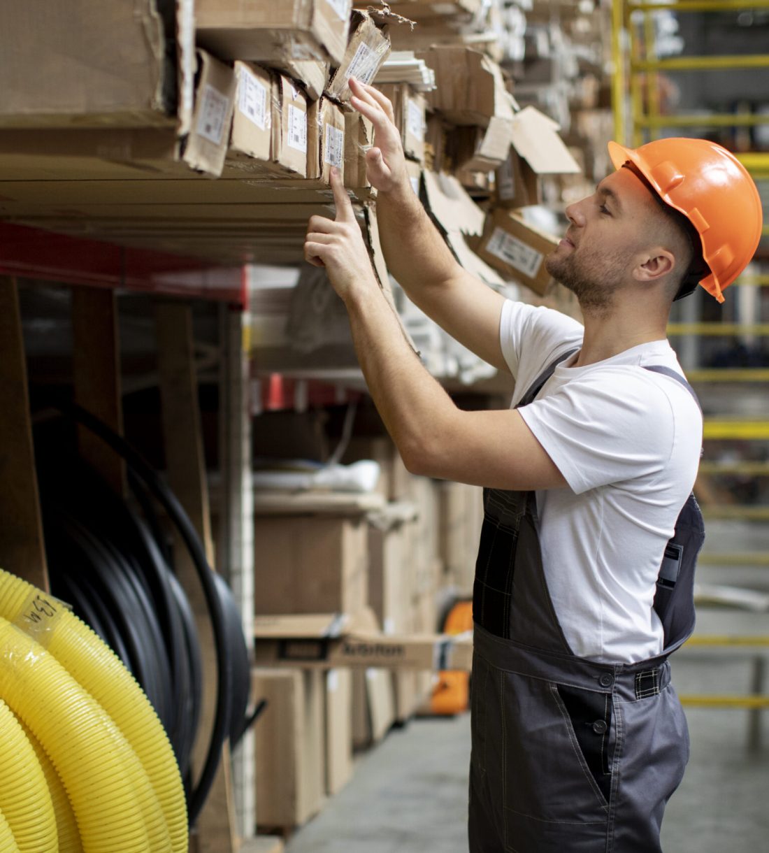 medium-shot-man-working-warehouse